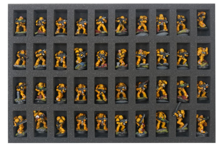 Foam tray with miniatures for size comparison.