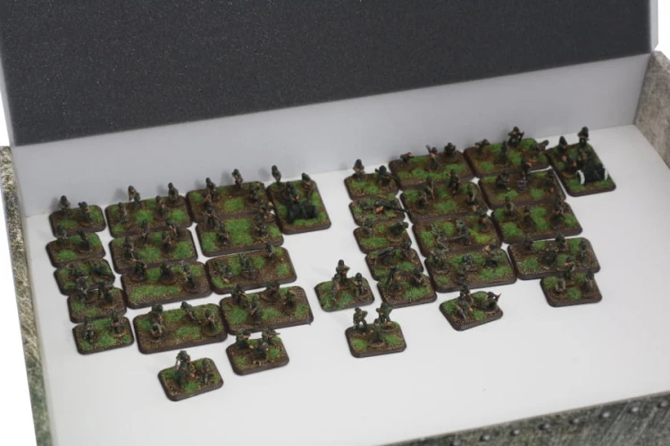 Standard-size magnetic box with Flames of War miniatures.