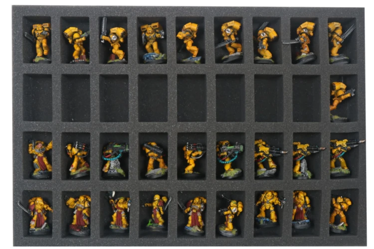 Foam tray with miniatures for size comparison.